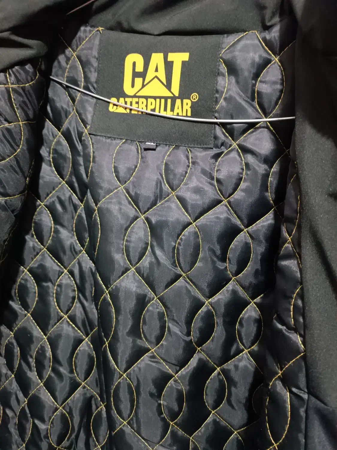 کاپشن|لباس|مشهد, شهید قربانی|دیوار