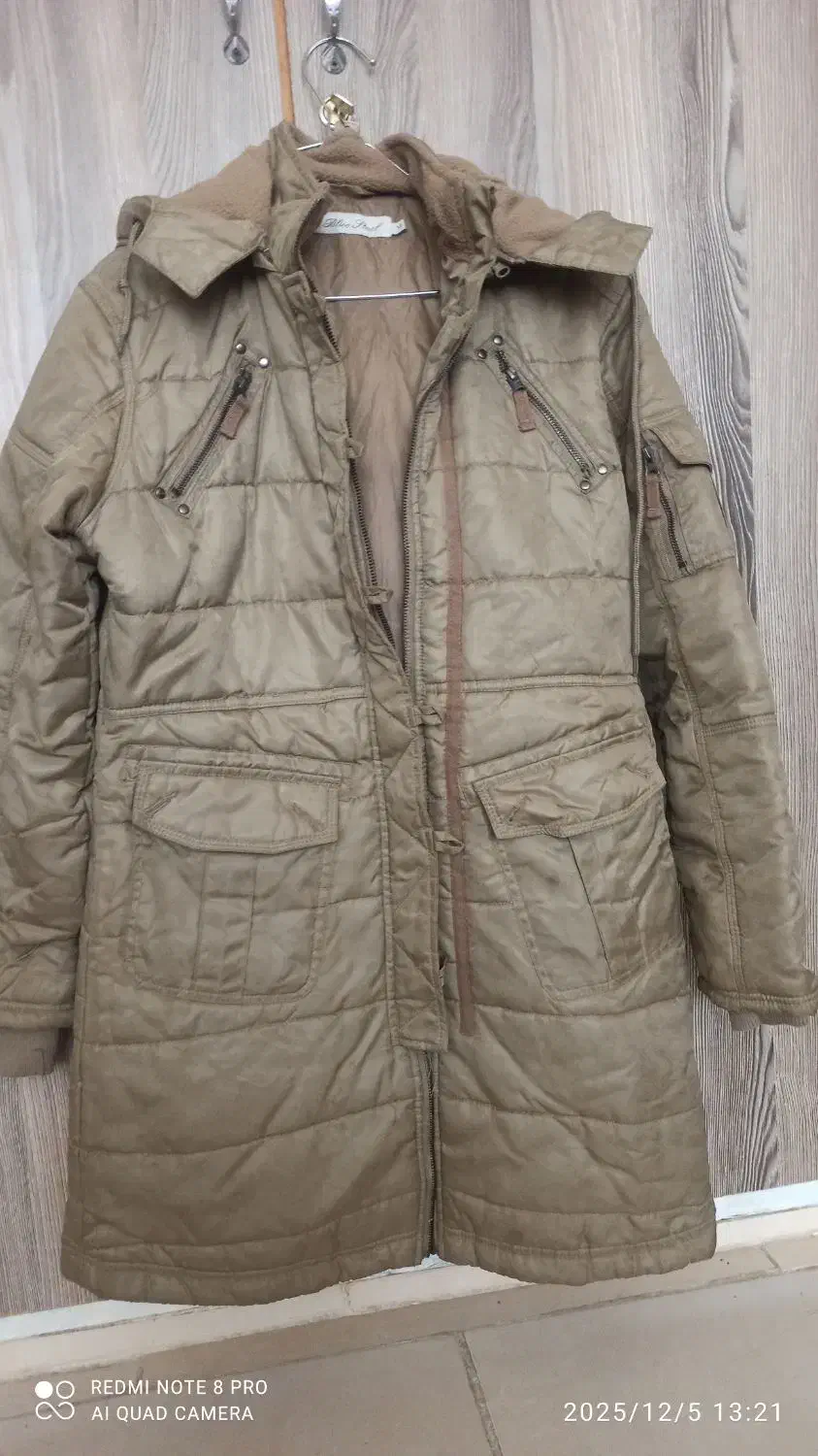 کاپشن|لباس|قم, نیروگاه|دیوار