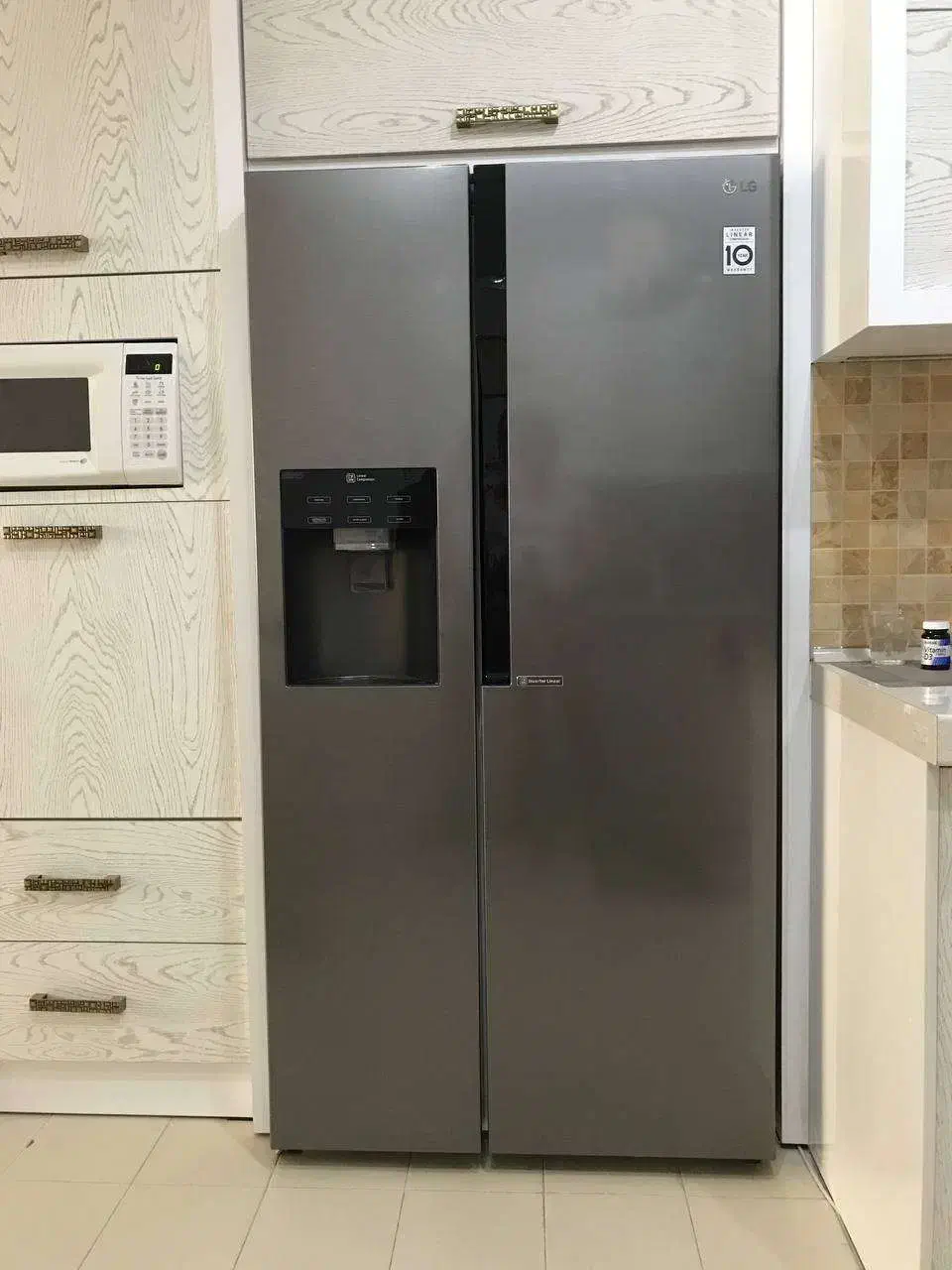 سایدبای سایدLG و سایر فروش به علت مهاجرت|یخچال و فریزر|مشهد, نیروی هوایی|دیوار