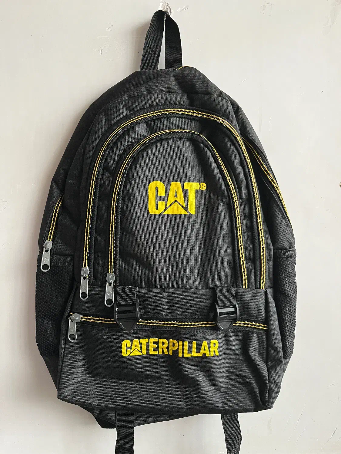 دو عدد کولهپشتی CAT تمیز و کماستفاده|کیف، کفش، کمربند|کاشان, مفتح|دیوار