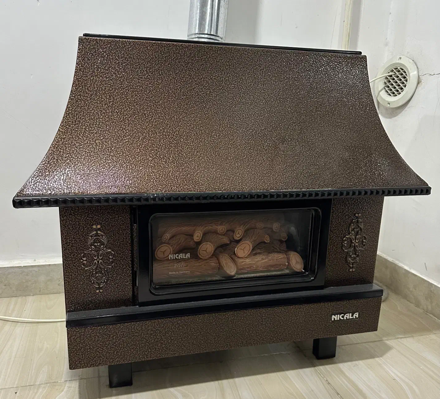 بخاری شومینه ای ۲۴ هزار نیک کالا|بخاری، هیتر، شومینه|بندر ماهشهر, |دیوار