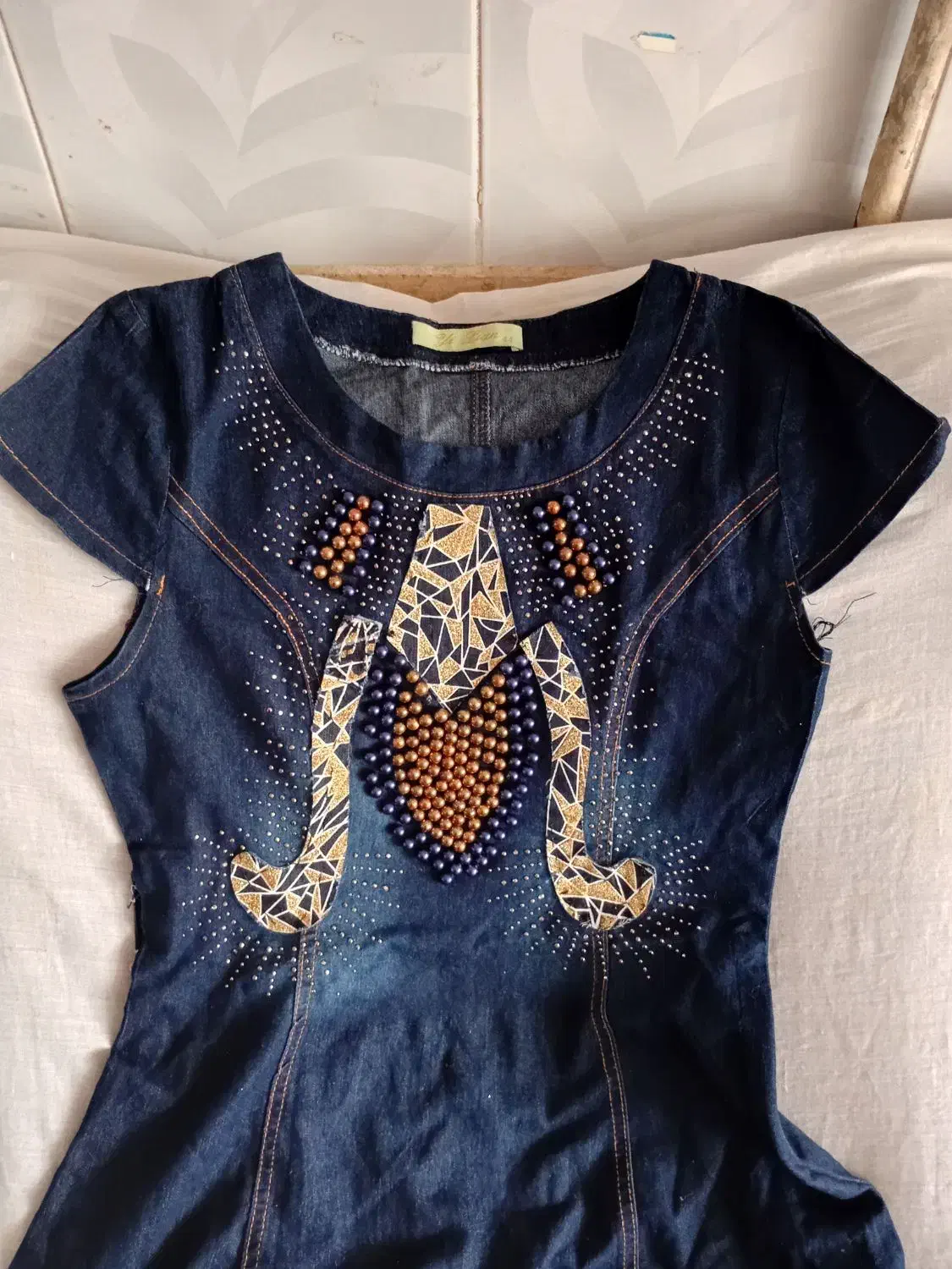 لباس|لباس|مشهد, هفده شهریور|دیوار