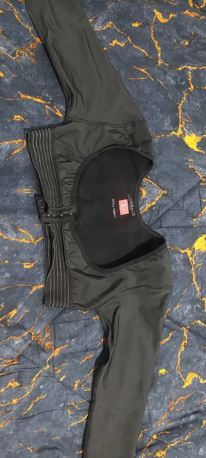 گن بازو بعد جراحی|لباس|قم, نیروگاه|دیوار