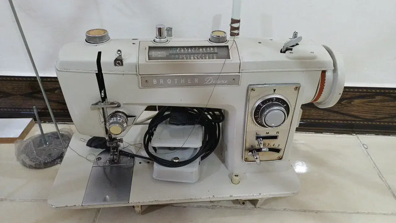 چرخ خیاطی|چرخ خیاطی و ریسندگی|قدس, شهر‌قدس|دیوار