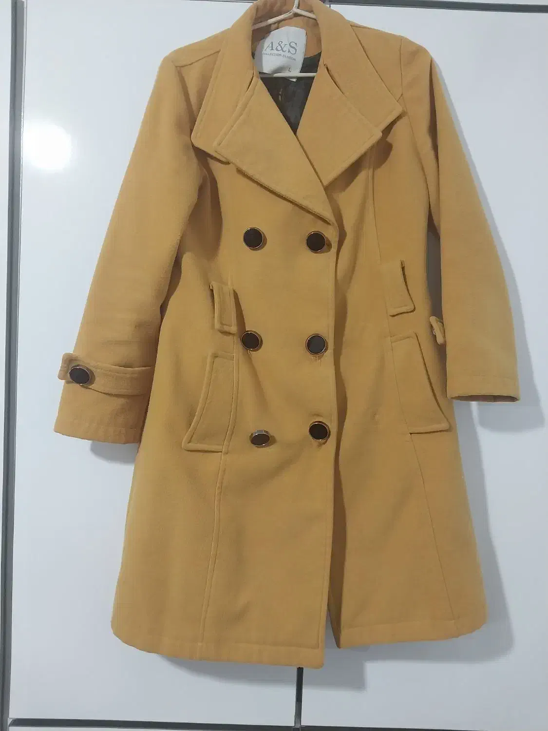 کاپشن|لباس|کرمانشاه, |دیوار