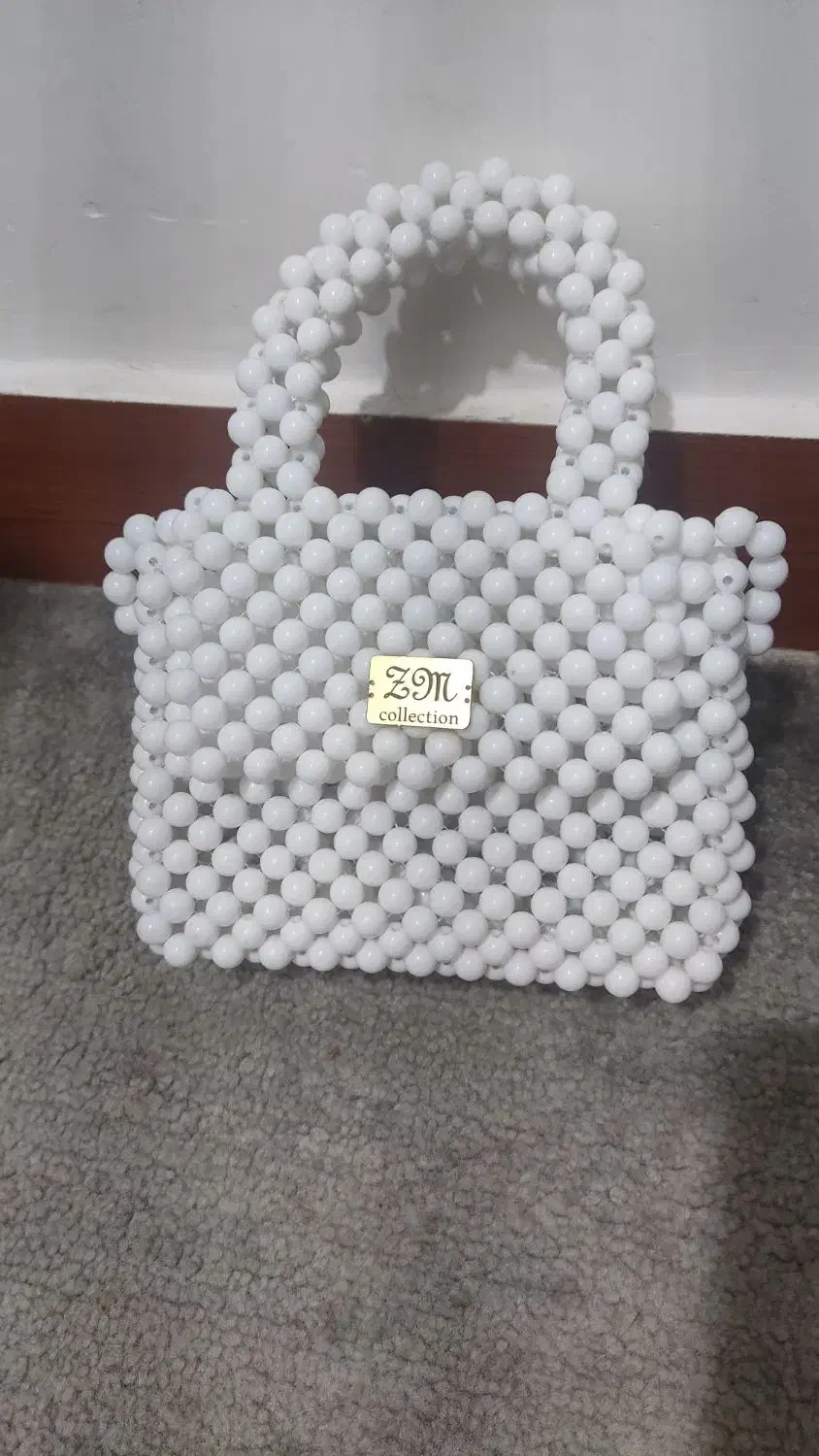 کیف مرواریدی|کیف، کفش، کمربند|رشت, خرسندی|دیوار