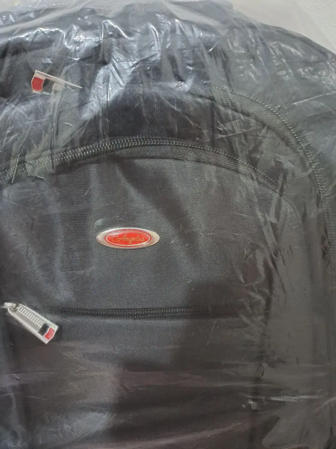 کوله پشتی|کیف، کفش، کمربند|قدس, شهر‌قدس|دیوار