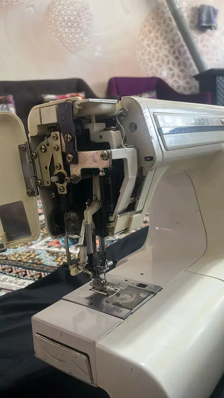 چرخ خیاطی ژانومه|چرخ خیاطی و ریسندگی|قدس, شهر‌قدس|دیوار