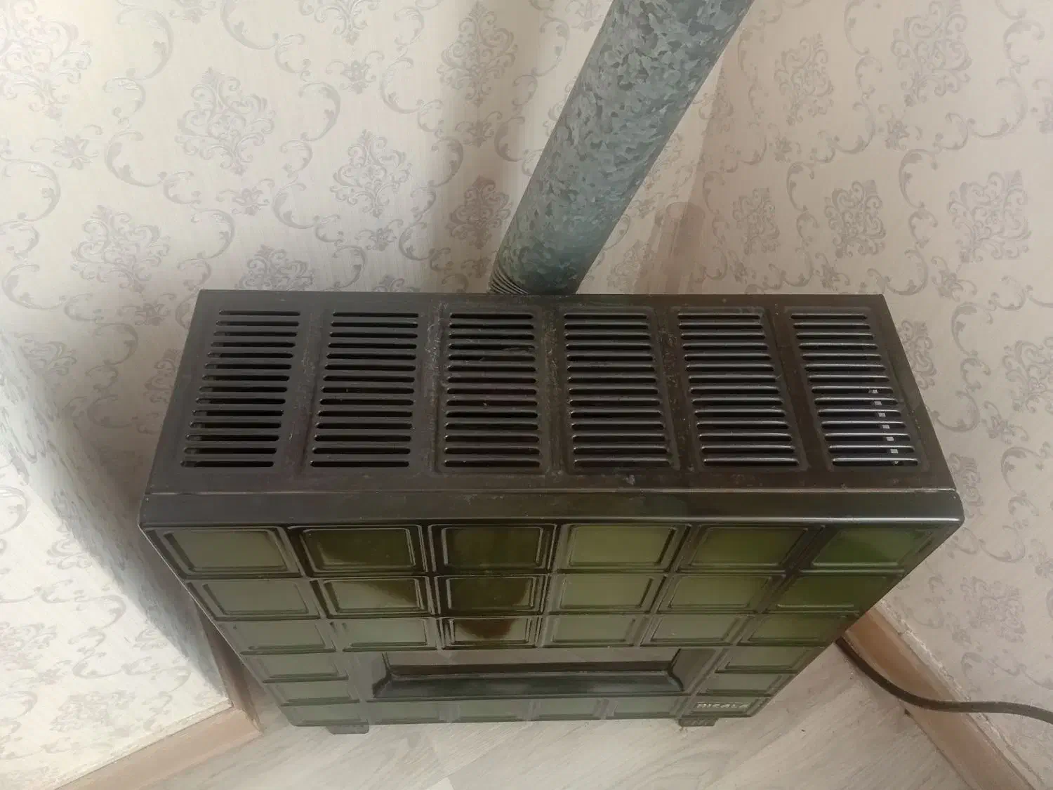 بخاری نیک کالا|بخاری، هیتر، شومینه|رشت, نیکمرام|دیوار