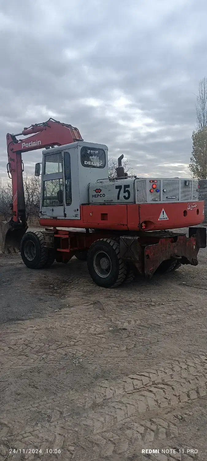 بیل مکانیکی پوکلن|خودرو سنگین|خوی, |دیوار