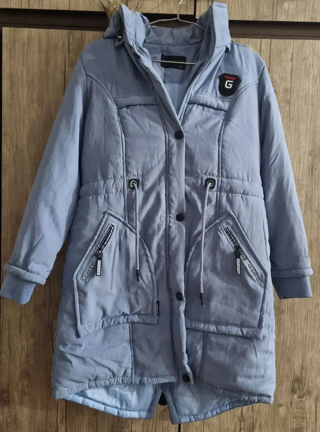 کاپشن|لباس|کهنوج, |دیوار