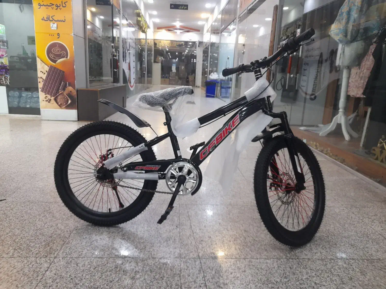 دوچرخه سایز بیست کمک دار ترمز دیسکی ستاره شهر|دوچرخه، اسکیت، اسکوتر|بندرعباس, |دیوار