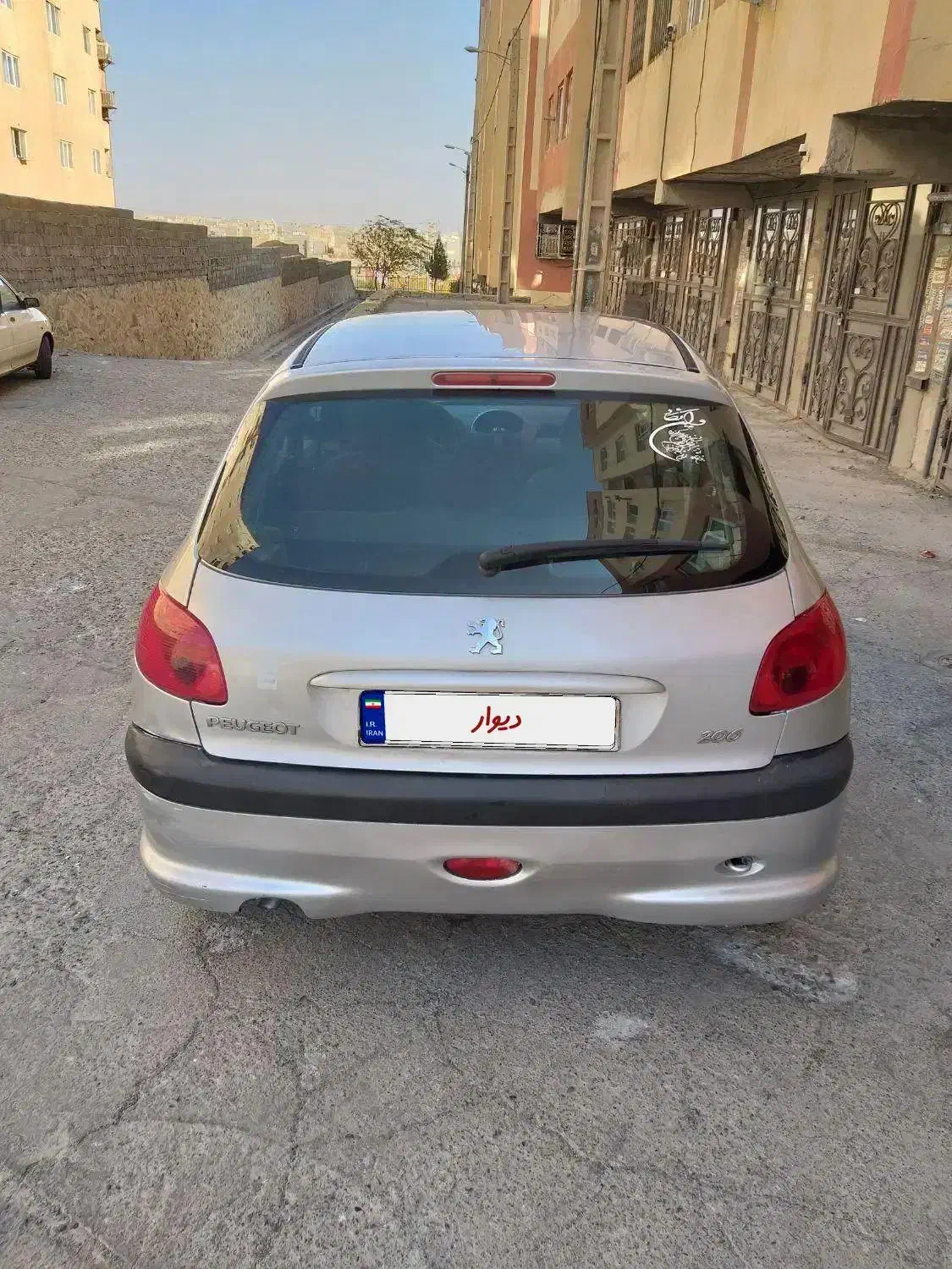 پژو ۲۰۶ مدل ۸۵ نقره ای متالیک|خودرو سواری و وانت|رباطکریم, مسکن مهر آبشناسان|دیوار