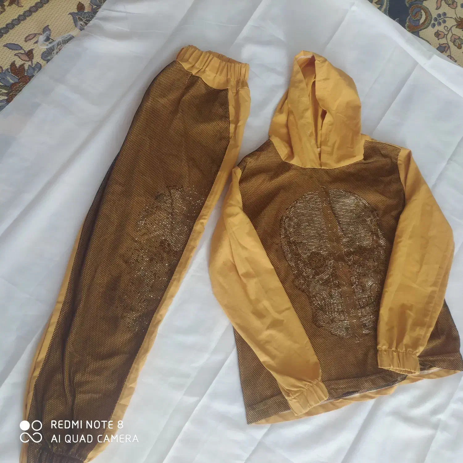 تعدادی مانتو زنانه|لباس|کاشان, کارگر|دیوار