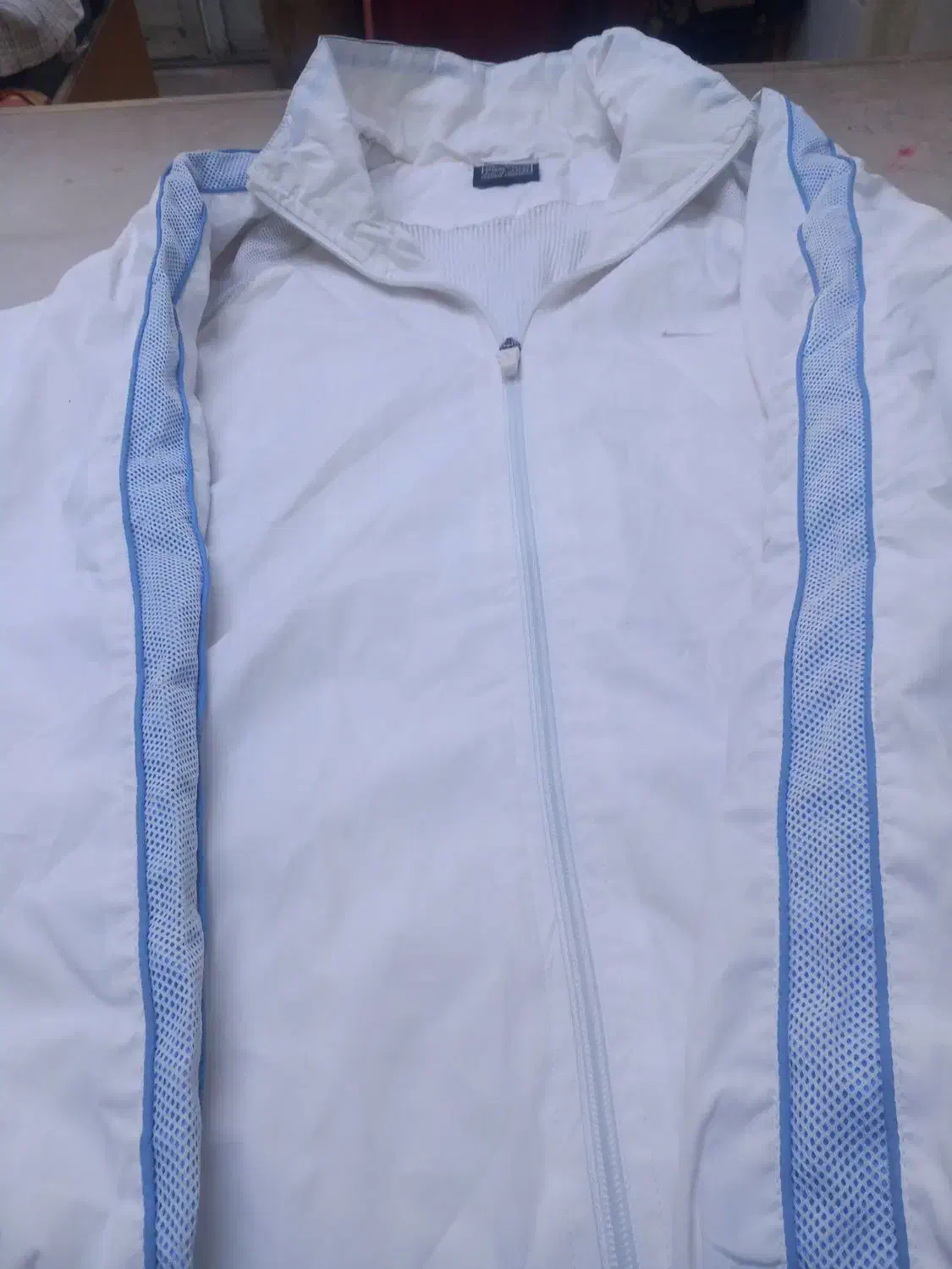 کاپشن و بادگیر|لباس|نیشابور, امام|دیوار