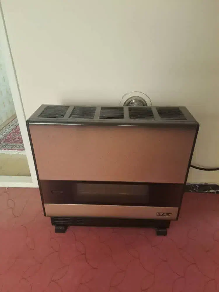 بخاری در حد نو سالم|بخاری، هیتر، شومینه|کرمان, |دیوار