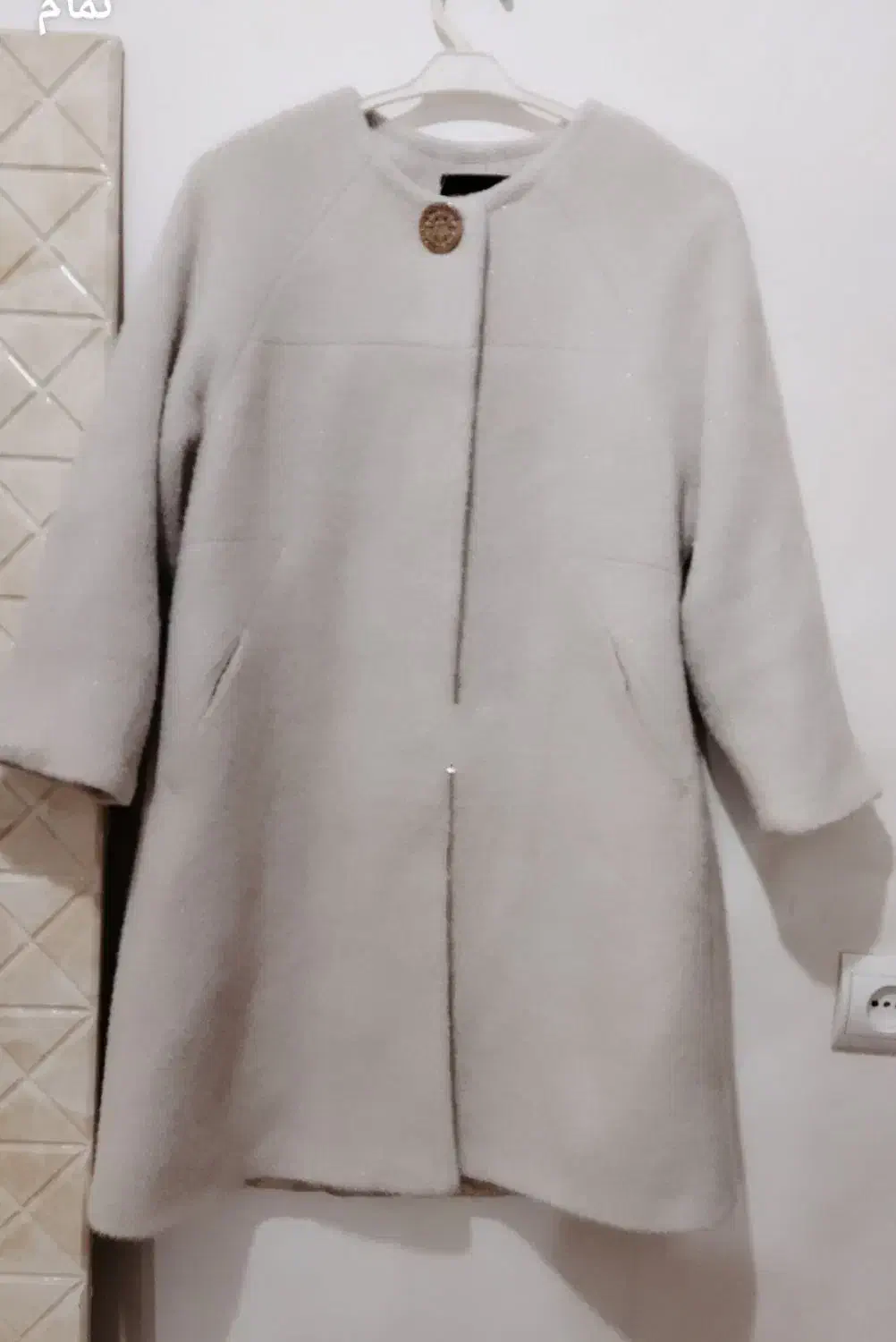 پالتو|لباس|رباطکریم, نصیرشهر|دیوار