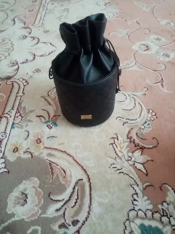 استوانه ای|کیف، کفش، کمربند|محمدیه-قزوین, |دیوار