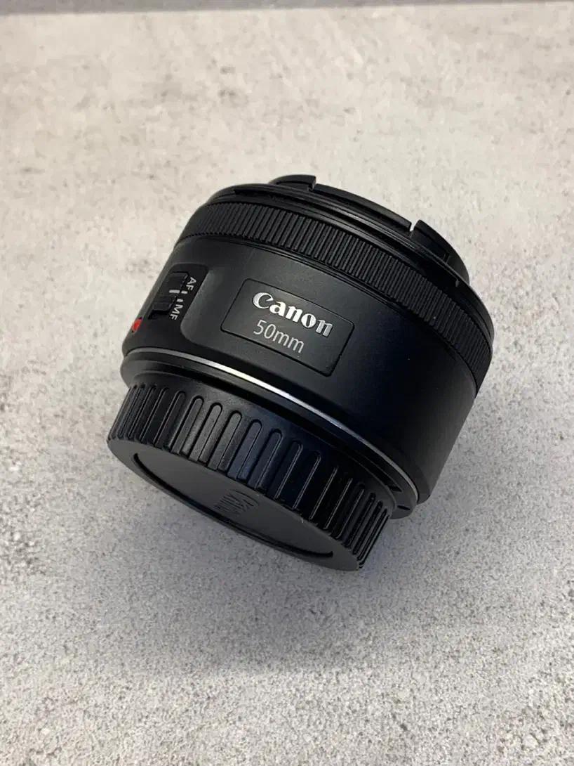 لنز کنون فیکس 50mm f1.8 STM مشابه نو|دوربین عکاسی و فیلم‌برداری|مشهد, سعد آباد|دیوار