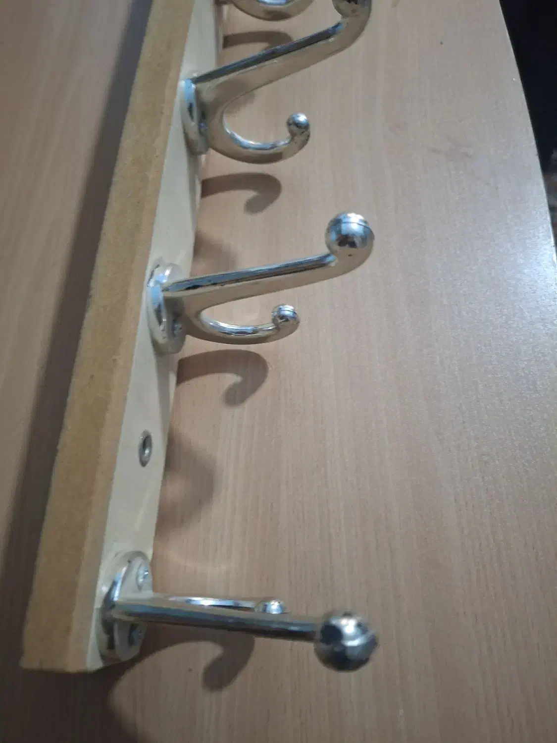 چوب لباسی|بندرخت و رخت‌آویز|اهواز, کوی آغاجاری|دیوار