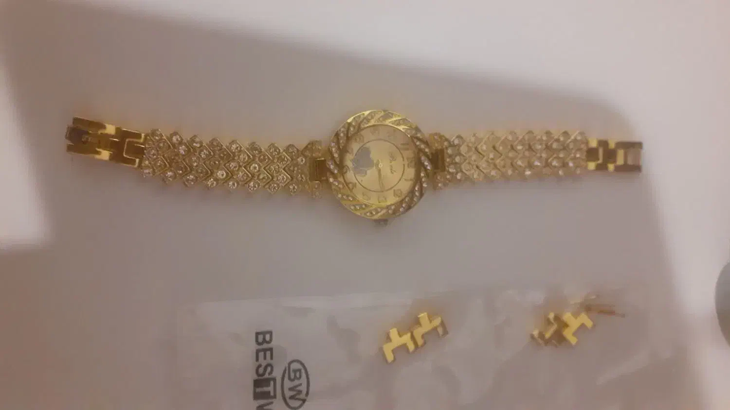 ساعت طلالی زنانه|ساعت|باغ ملک, |دیوار