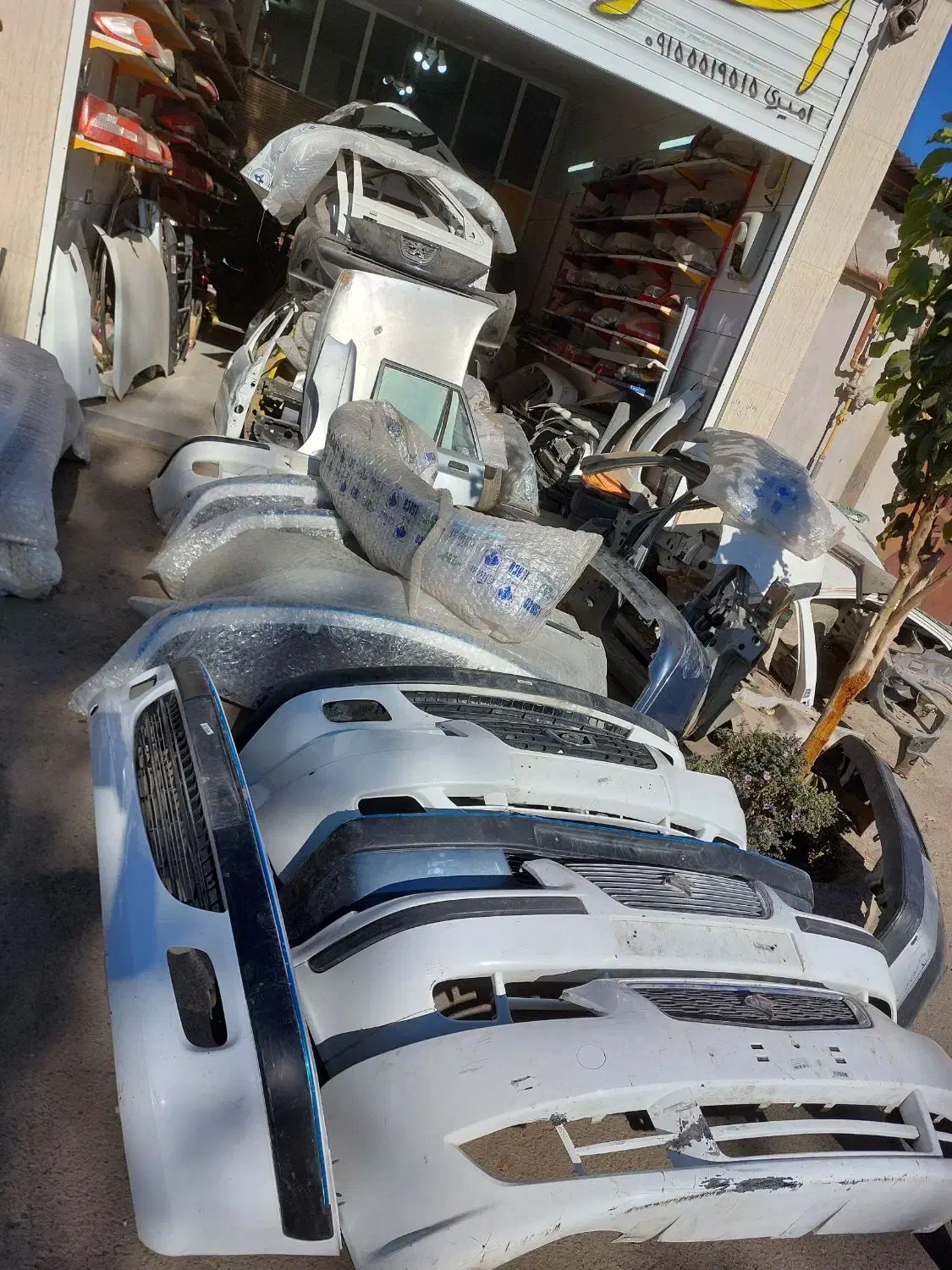 استوک دنا و ۲۰۷|قطعات یدکی و لوازم جانبی|نیشابور, باغ نو|دیوار