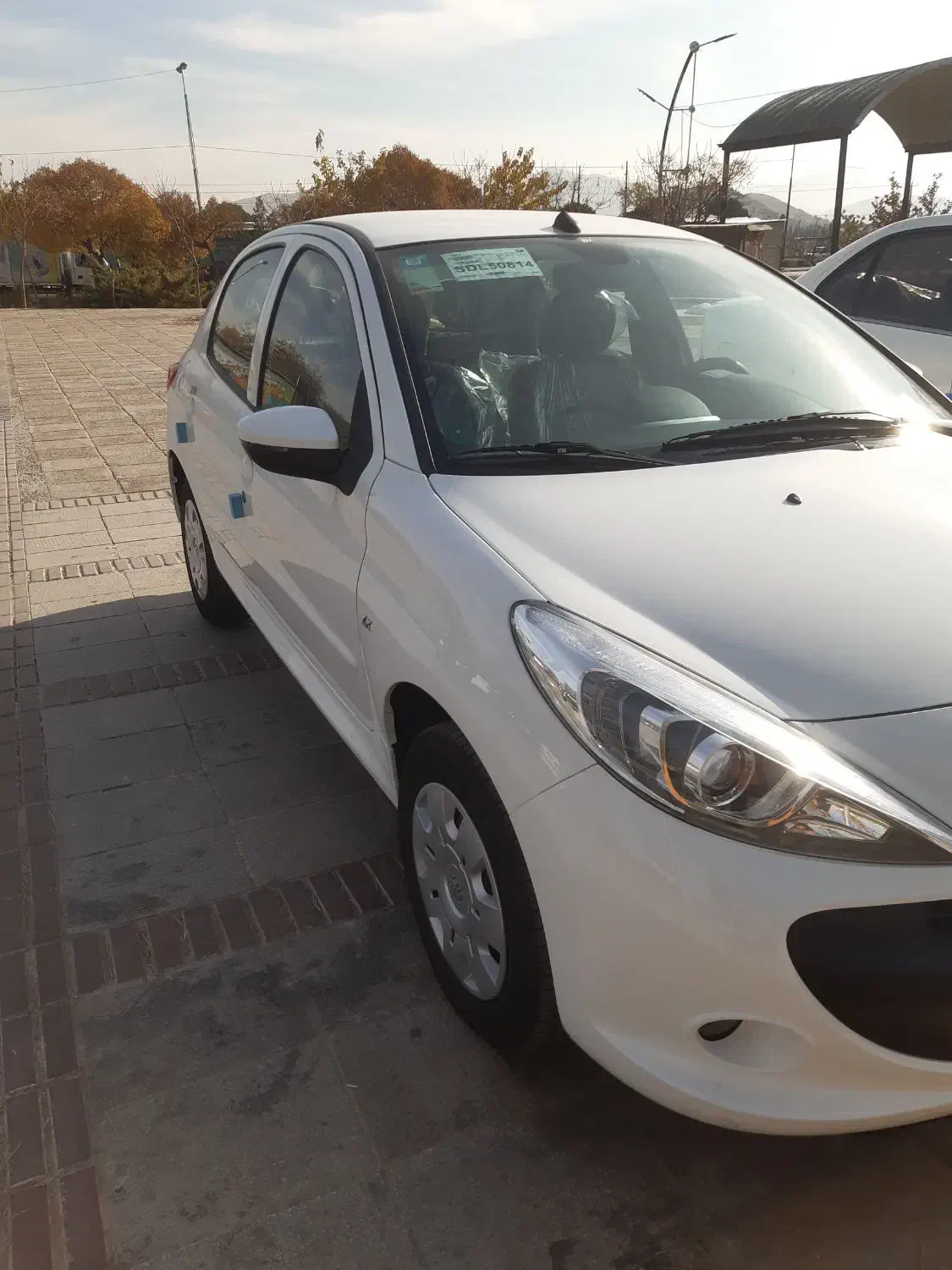 پژو ۲۰۷ تیوتری سفید صفر کیلومتر ۱۴۰۴|خودرو سواری و وانت|شیراز, شهرک بزین|دیوار