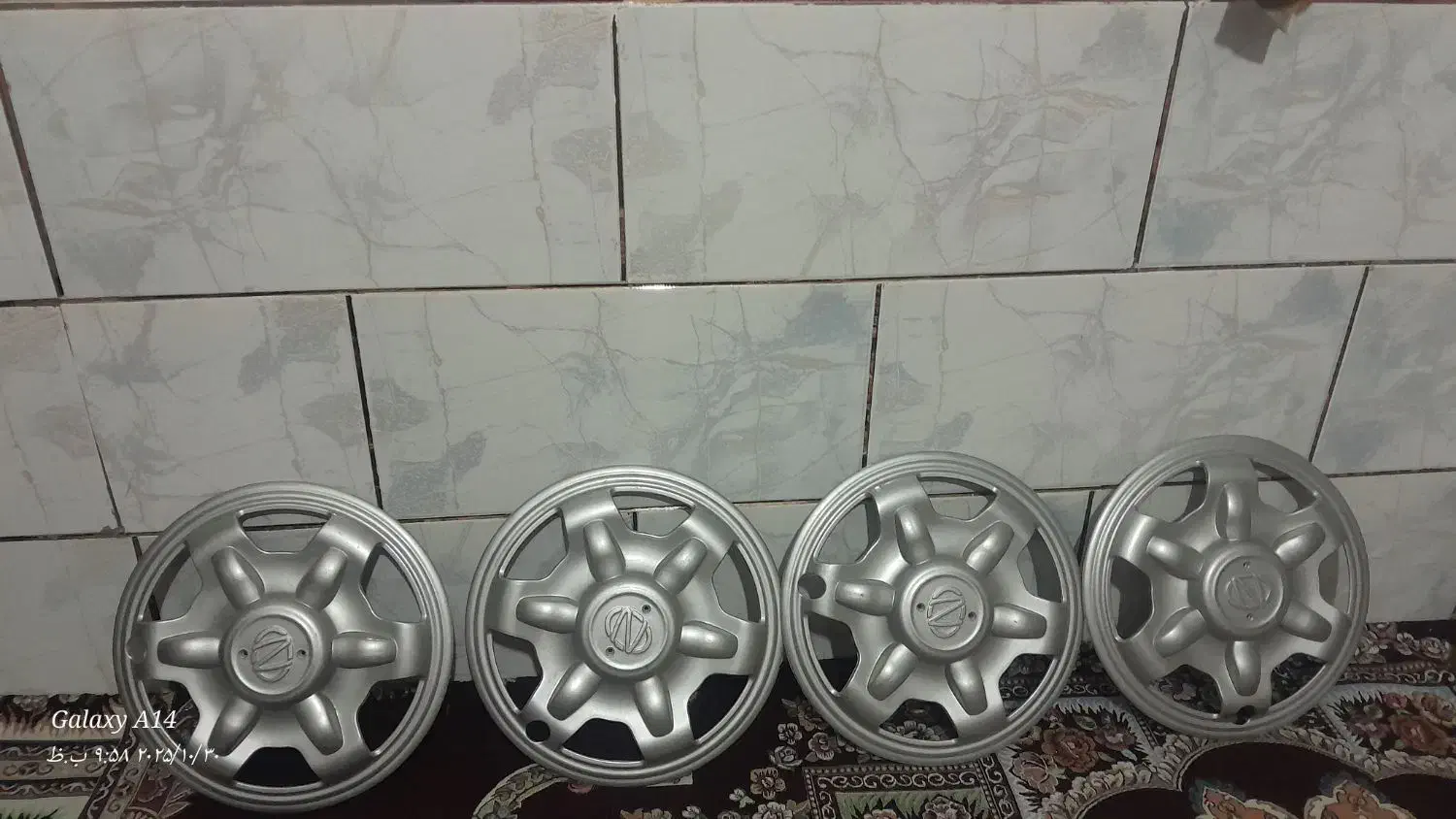 قالپاق نیسان|قطعات یدکی و لوازم جانبی|شیراز, کوشک میدان|دیوار