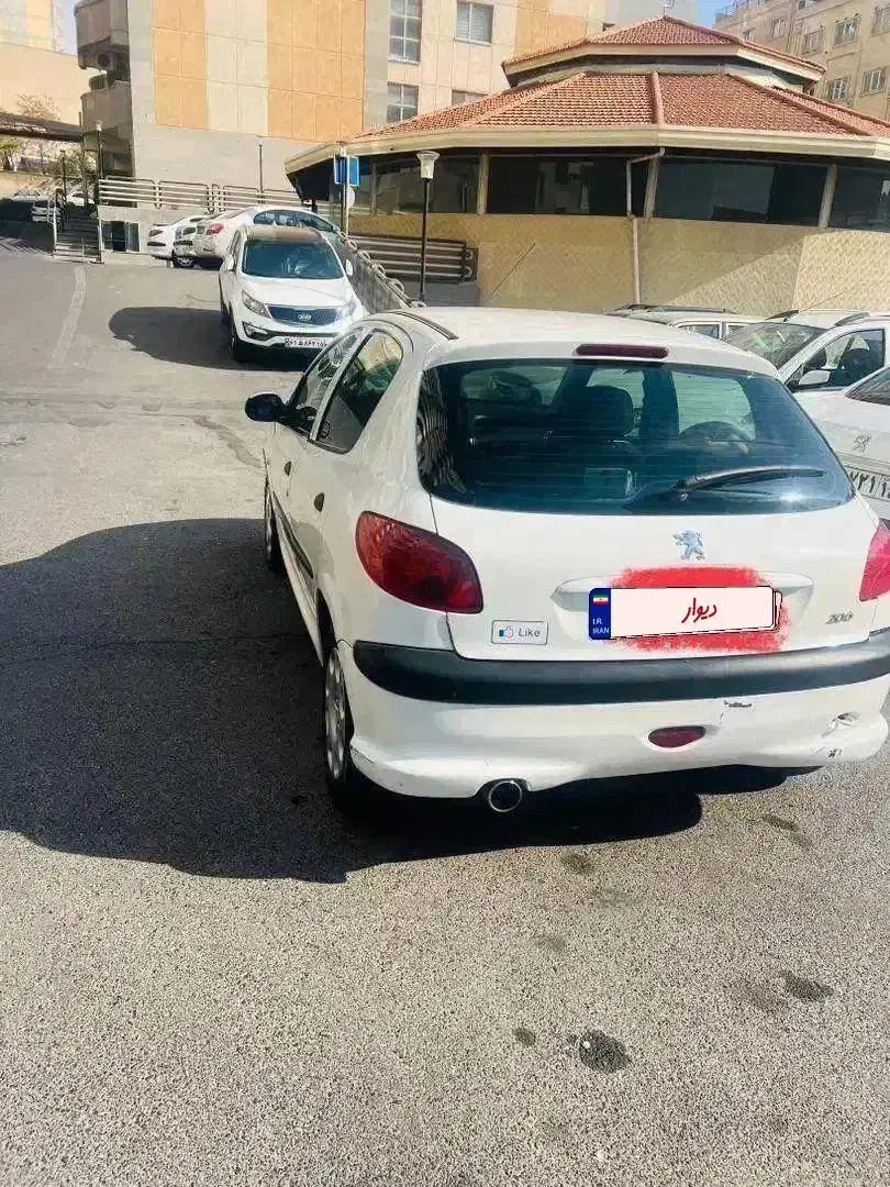 پژو ۲۰۶ تیپ ۲ سفید مدل ۱۳۸۹ بیمه نو|خودرو سواری و وانت|تبریز, |دیوار