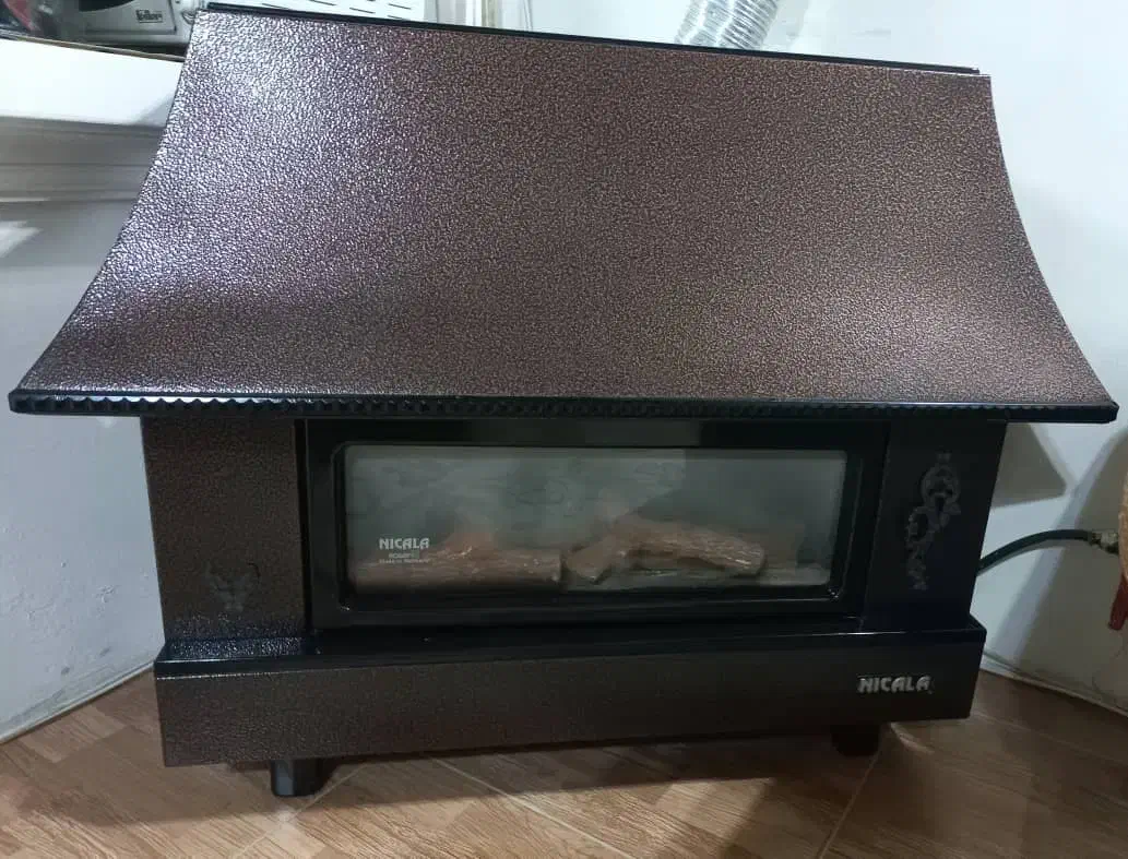 بخاری گازی شومینه نیک کالا|بخاری، هیتر، شومینه|رشت, سعدی (تختی)|دیوار