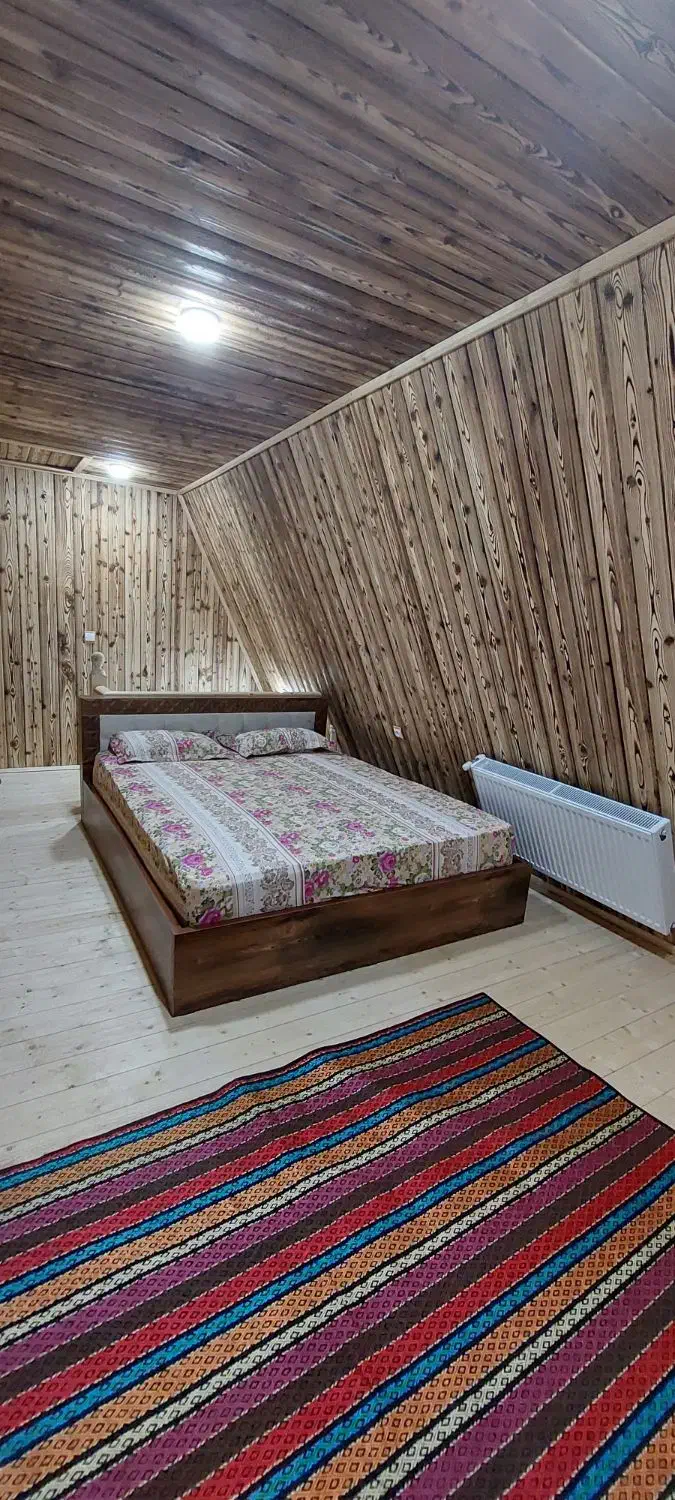 کلبه سوئیسی تک خواب بهار نارنج|اجارهٔ کوتاه‌مدت ویلا و باغ|شاندرمن, |دیوار