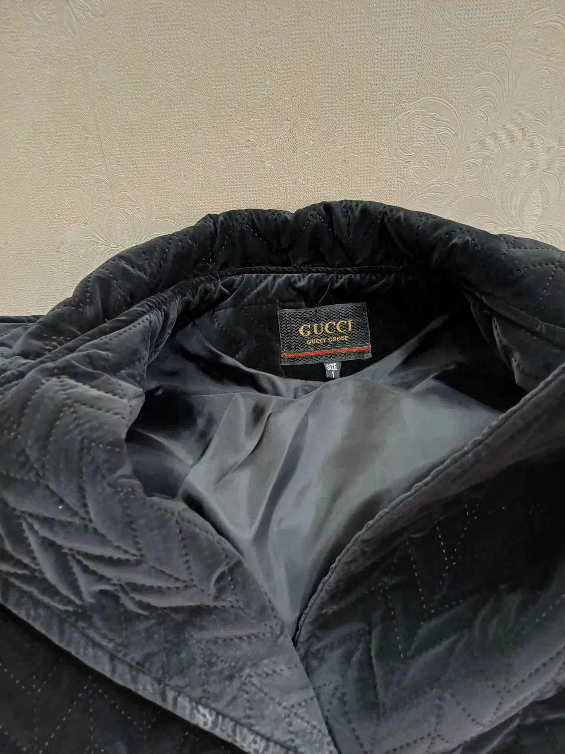 پالتو برند کوچی و‌کاپشن|لباس|قدس, شهر‌قدس|دیوار