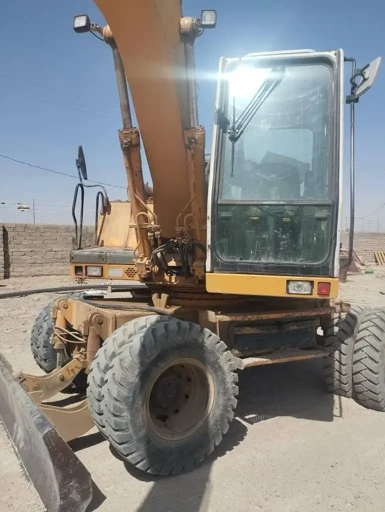 بیل مکانیکی A900 مدل 1999|خودرو سنگین|ابریشم, |دیوار