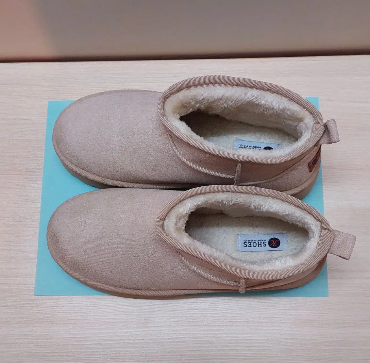 کفش آگ|کیف، کفش، کمربند|اصفهان, صدف|دیوار