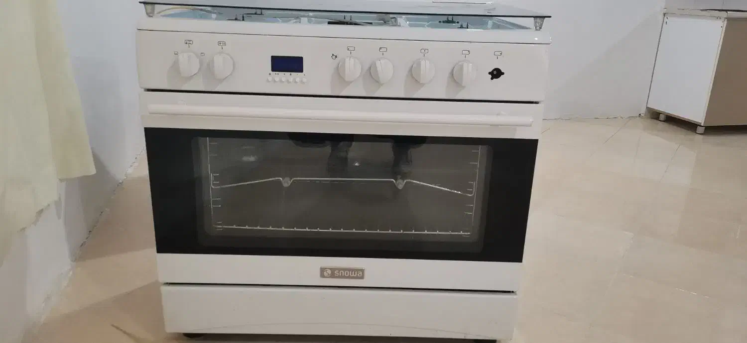 فرگاز اسنوا در حد نو و سرویس چوب کم کار|اجاق گاز و لوازم برقی پخت‌وپز|کهنوج, |دیوار