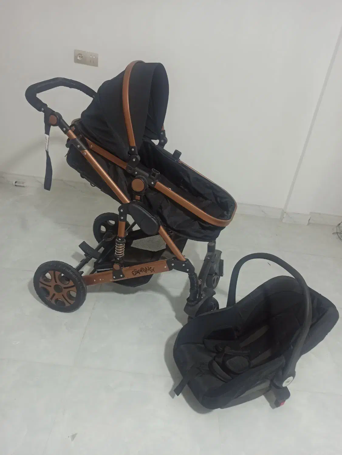 کالسکه وکریر اسپرینگ مدل اسپیدا بدنه برنز رنگ مشکی|کالسکه و لوازم جانبی|کرج, ترمینال کلانتری|دیوار