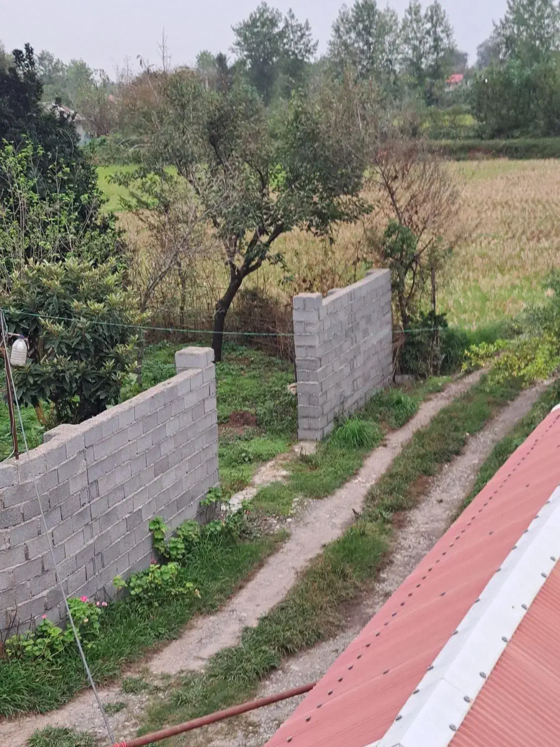 گیلان سنگر450 متر مسکونی 2000متر زمین باغ فنس شد|فروش زمین و ملک کلنگی|سنگر, |دیوار