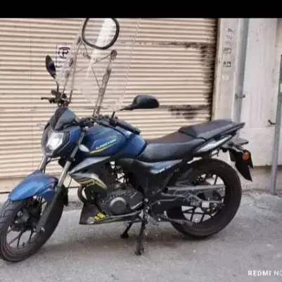 کیوجی 150|موتورسیکلت|ری, علایین|دیوار