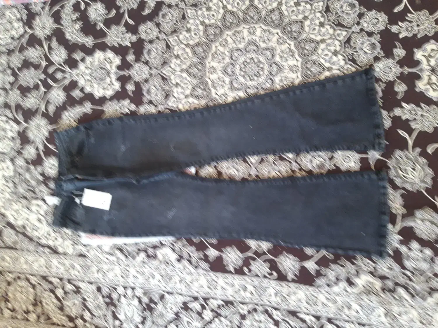 شلوار جین|لباس|شیراز, بعثت|دیوار