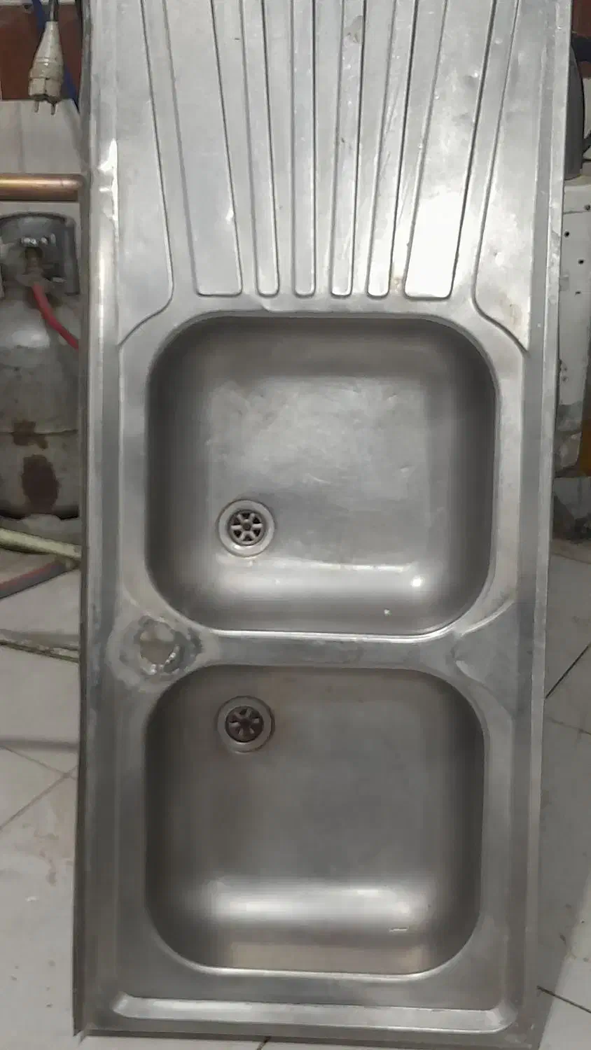 سینگ دوقلو|آب‌چکان و نظم‌دهنده ظروف|تربت‌حیدریه, بوستان باغ ملی|دیوار