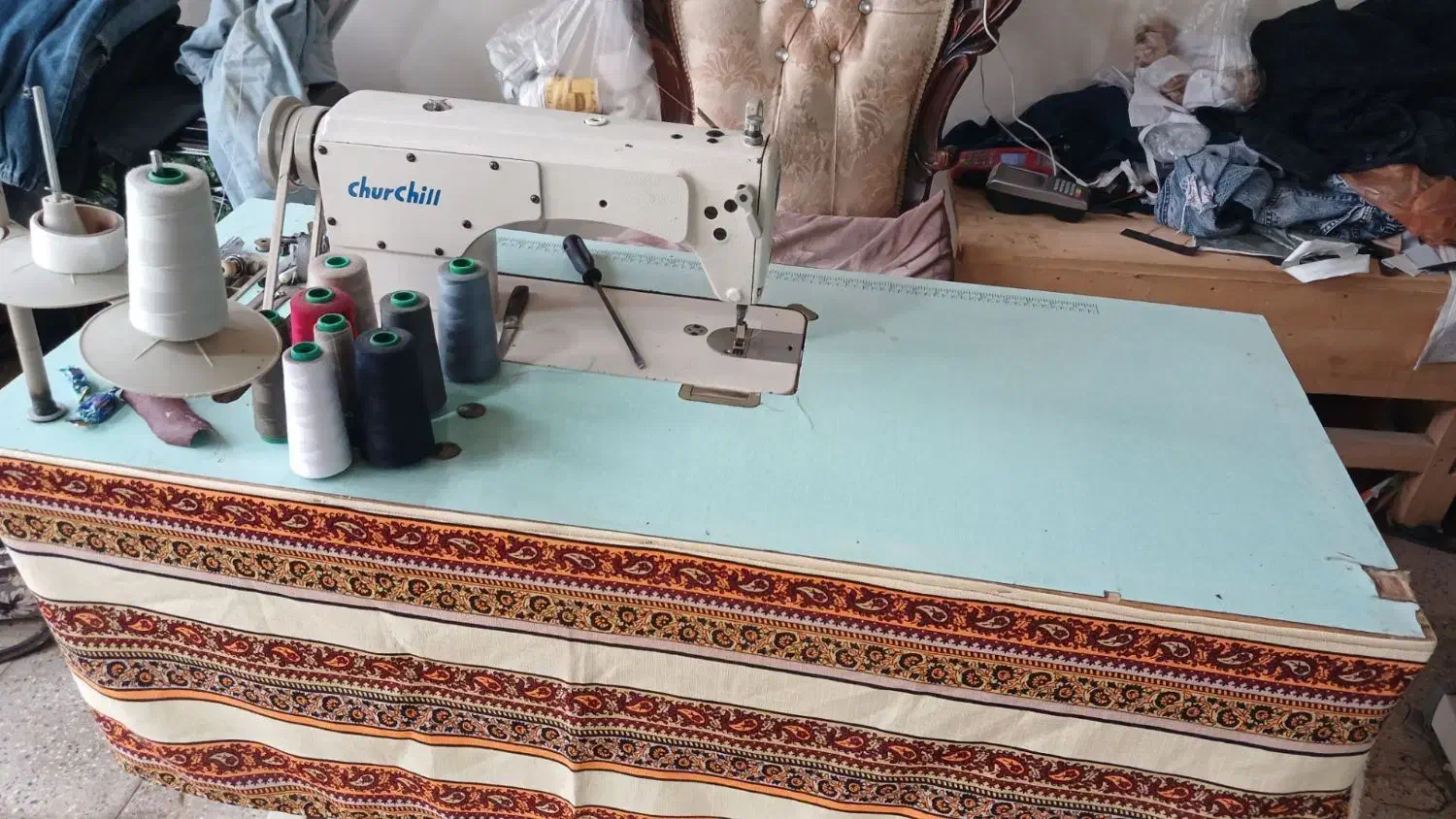 خیا|چرخ خیاطی و ریسندگی|عنبران, |دیوار