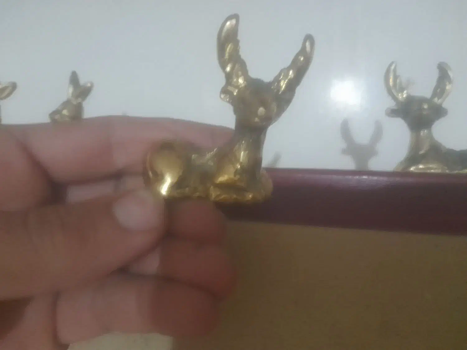 گوزن برنجی دکری|کلکسیون اشیاء عتیقه|نیشابور, خط کاشمر|دیوار