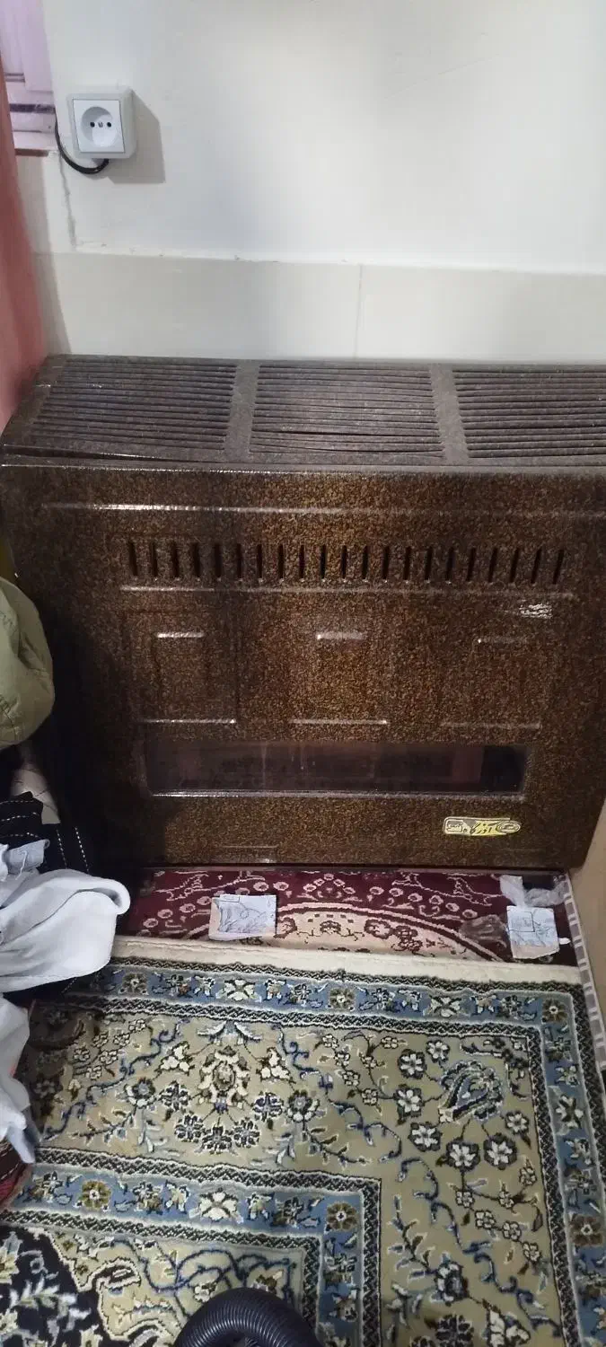 بخاری گازی ۱۰۰۰۰|بخاری، هیتر، شومینه|فومن, |دیوار