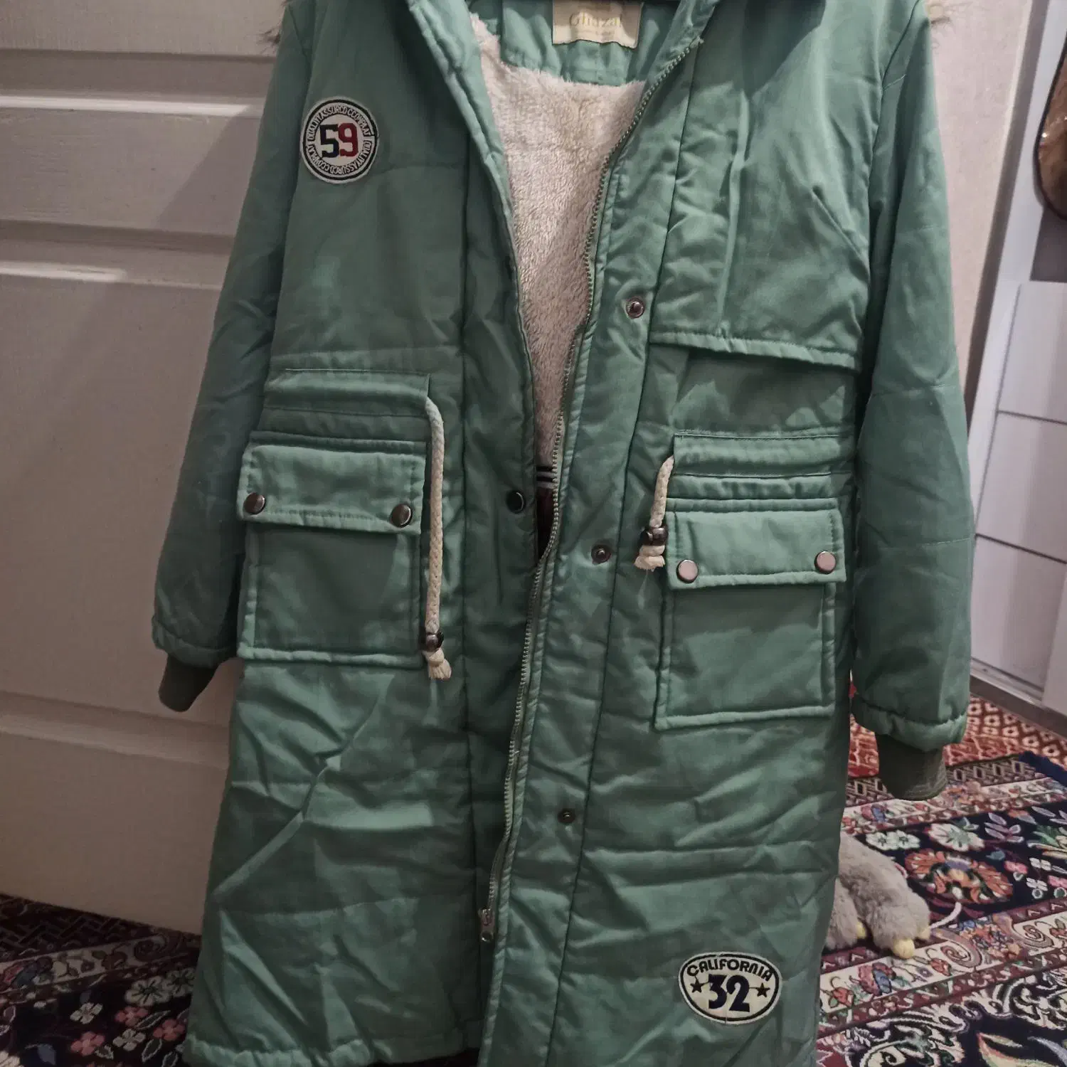 کاپشن|لباس|باقرشهر, |دیوار