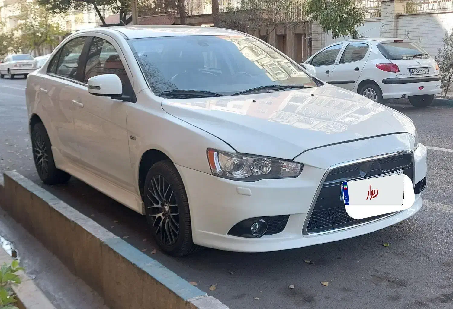 میتسوبیشی لنسر ۲۰۱۵ تیپ۴ فول|خودرو سواری و وانت|تهران, مینی‌سیتی (شهرک نفت)|دیوار