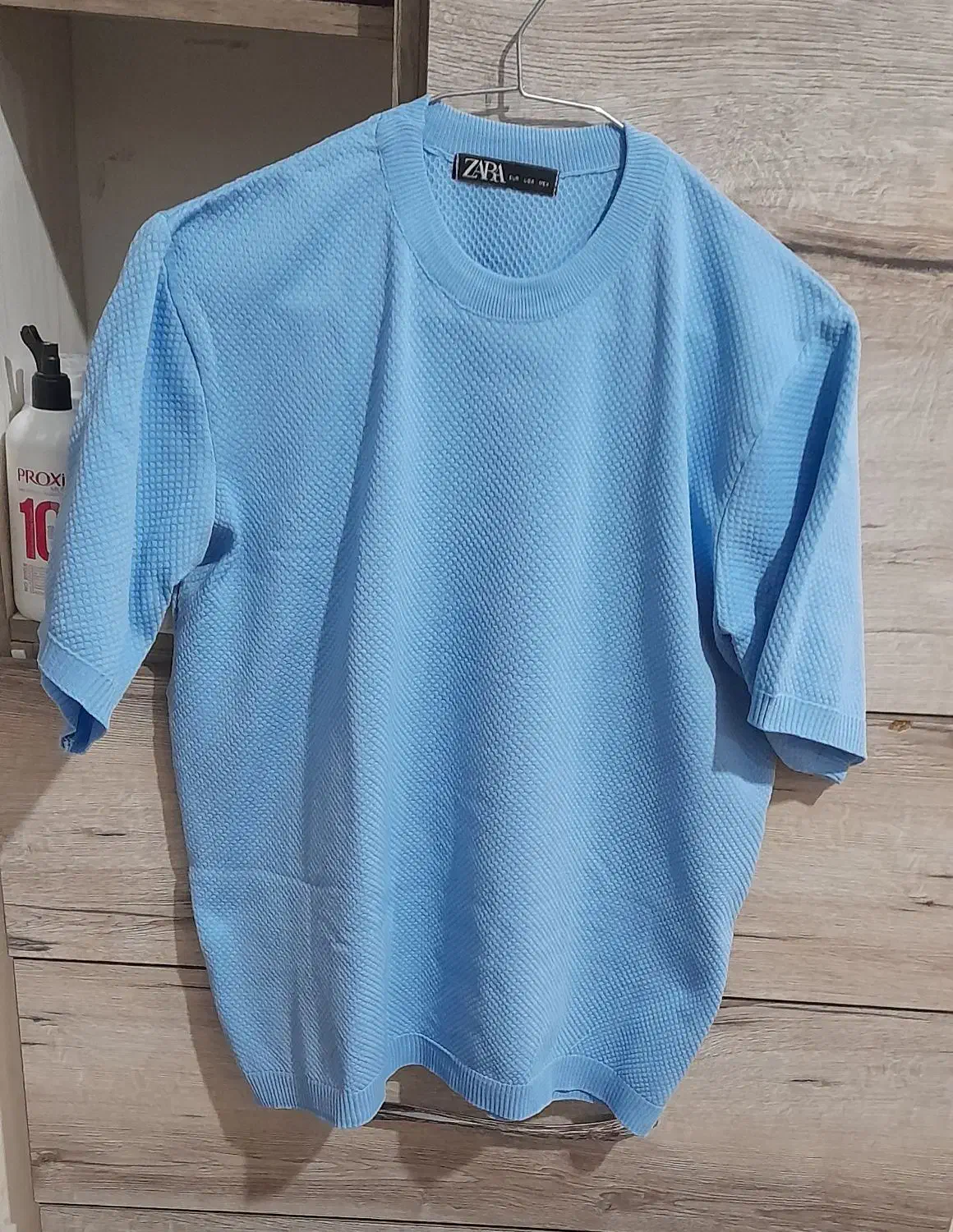 تعدادی لباس نو|لباس|تربت جام, شهید نصرالهی|دیوار