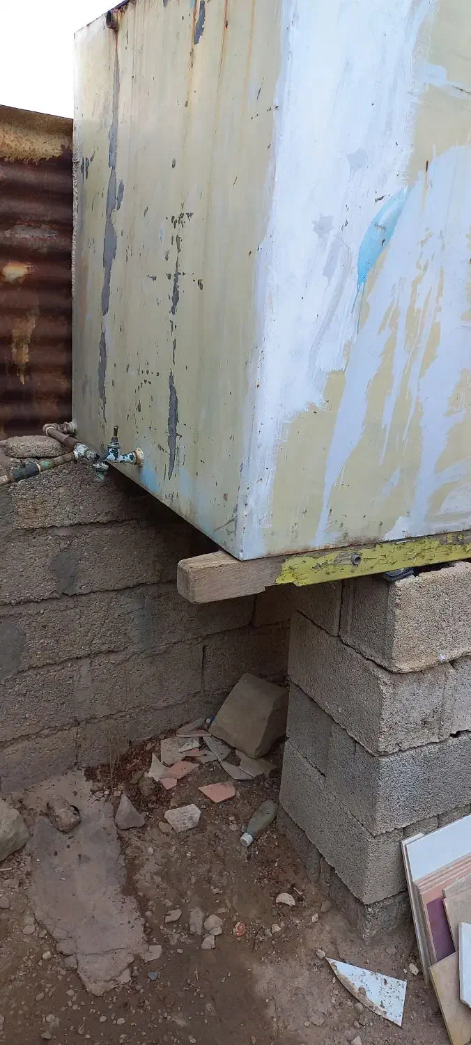 تانکی هزار لیتری. و سه عدد لوله سه اینچ|ابزارآلات|مسجد سلیمان, |دیوار