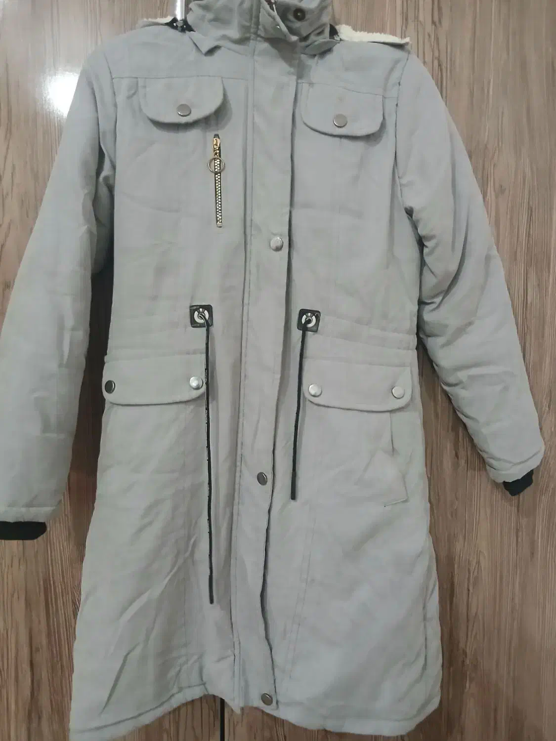 کاپشن|لباس|تربت جام, میان جام|دیوار