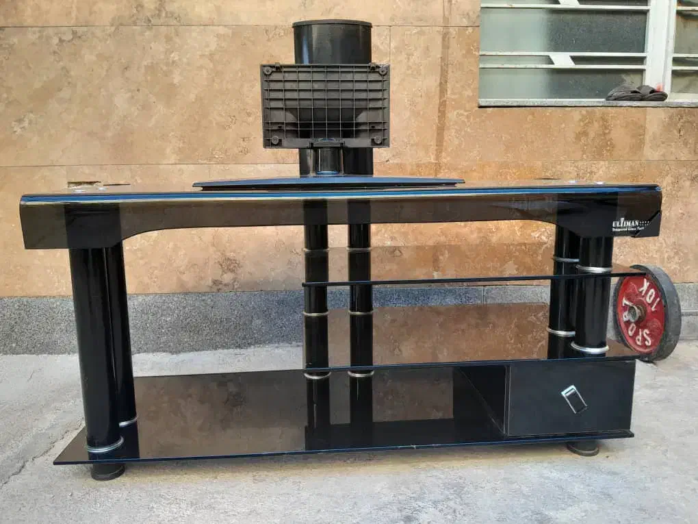 میز شیشه ای تلوزیون در حد نو|میز تلویزیون|شیراز, قلعه نو|دیوار