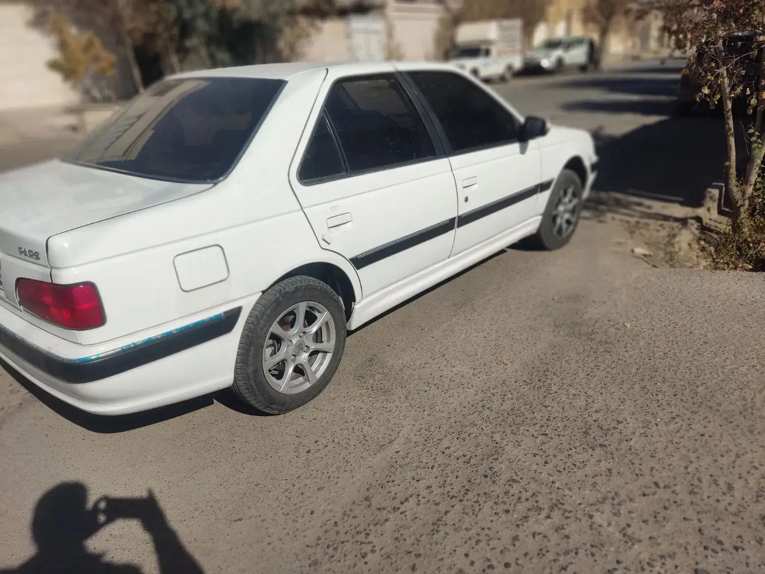 پژو پارس مدل ۱۴۰۲ سفید موتور سفارشی xup7|خودرو سواری و وانت|سیرجان, |دیوار